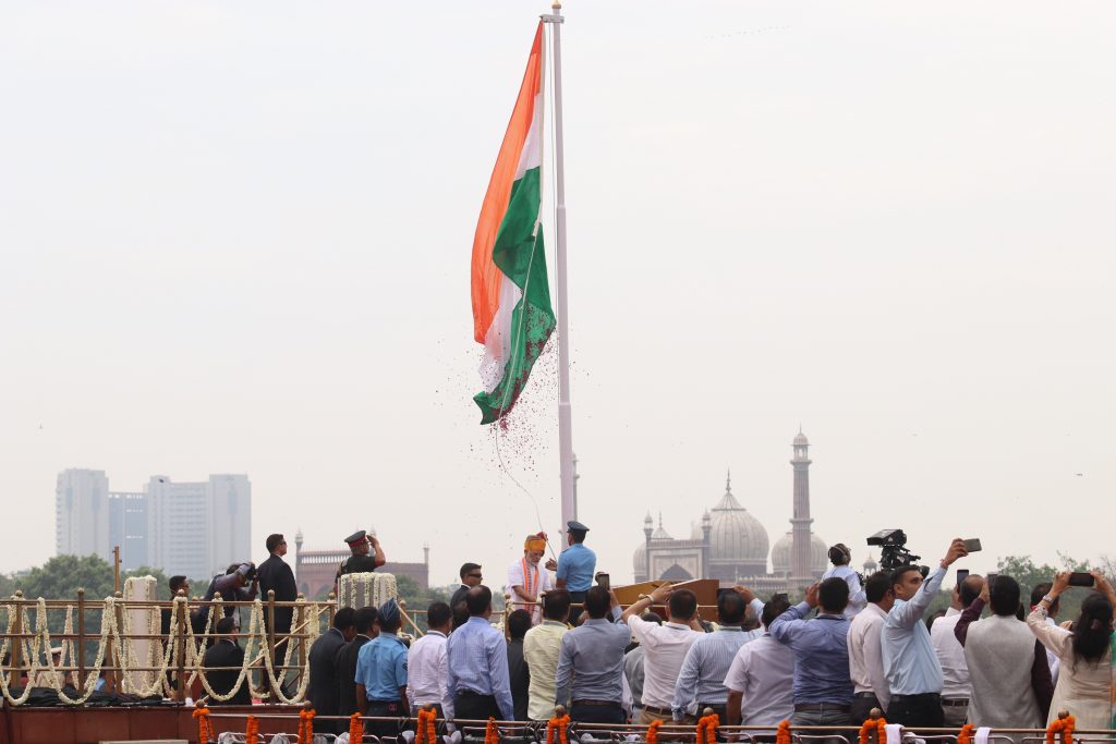 Prime Minister Narendra Modi raises the tri-colour flag at the Red Fort on Independence Day