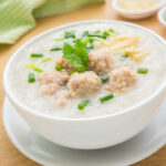 Congee,With,Minced,Pork,In,Bowl